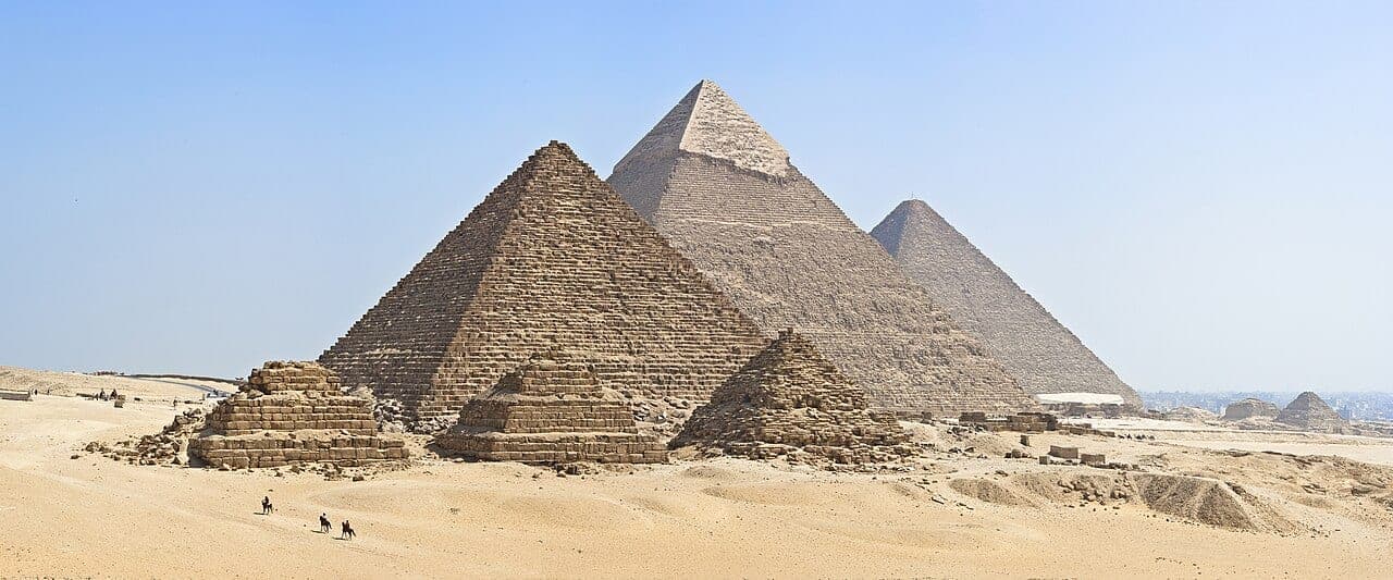 The three main pyramids of the Giza necropolis rising from the desert plateau near Cairo, Egypt