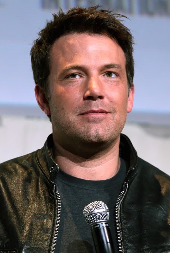 Ben Affleck holding a microphone at San Diego Comic-Con in July 2016.