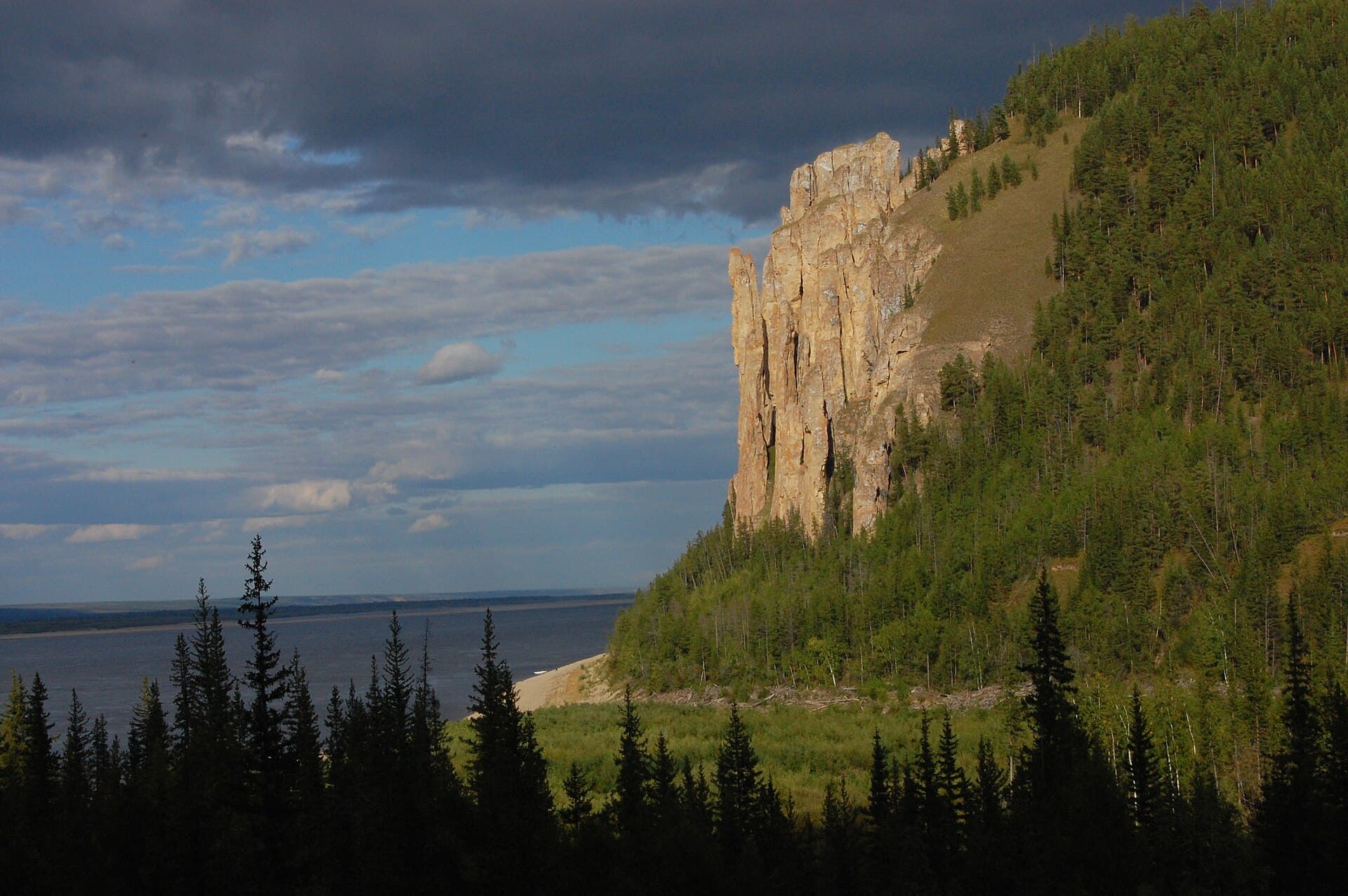 The Lena Pillars, a wall of weathered limestone columns rising from the bank of the Lena River in the Sakha Republic, inscribed by UNESCO in 2012