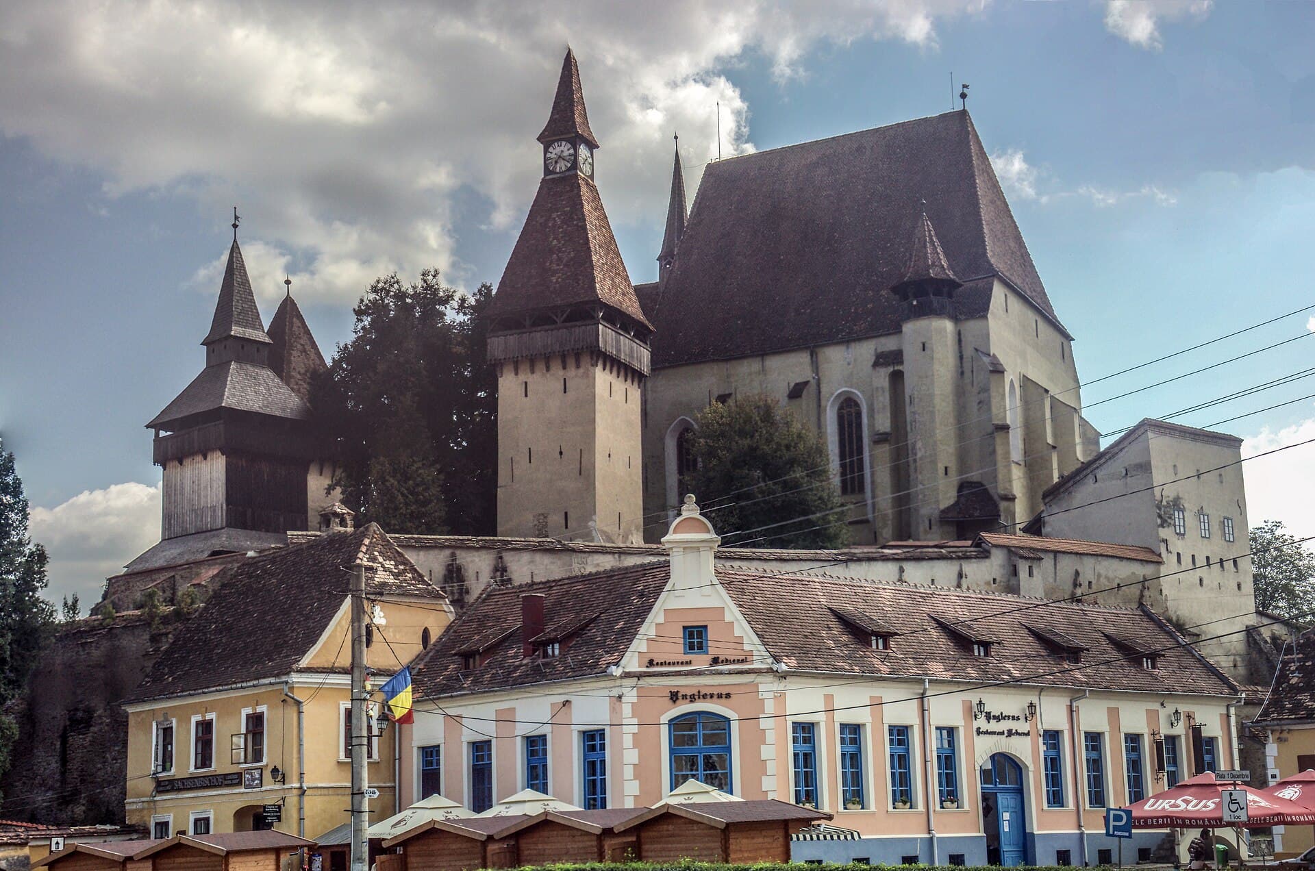 The fortified church at Biertan in Transylvania, its late Gothic church ringed by three defensive walls and towers on a hill above the village