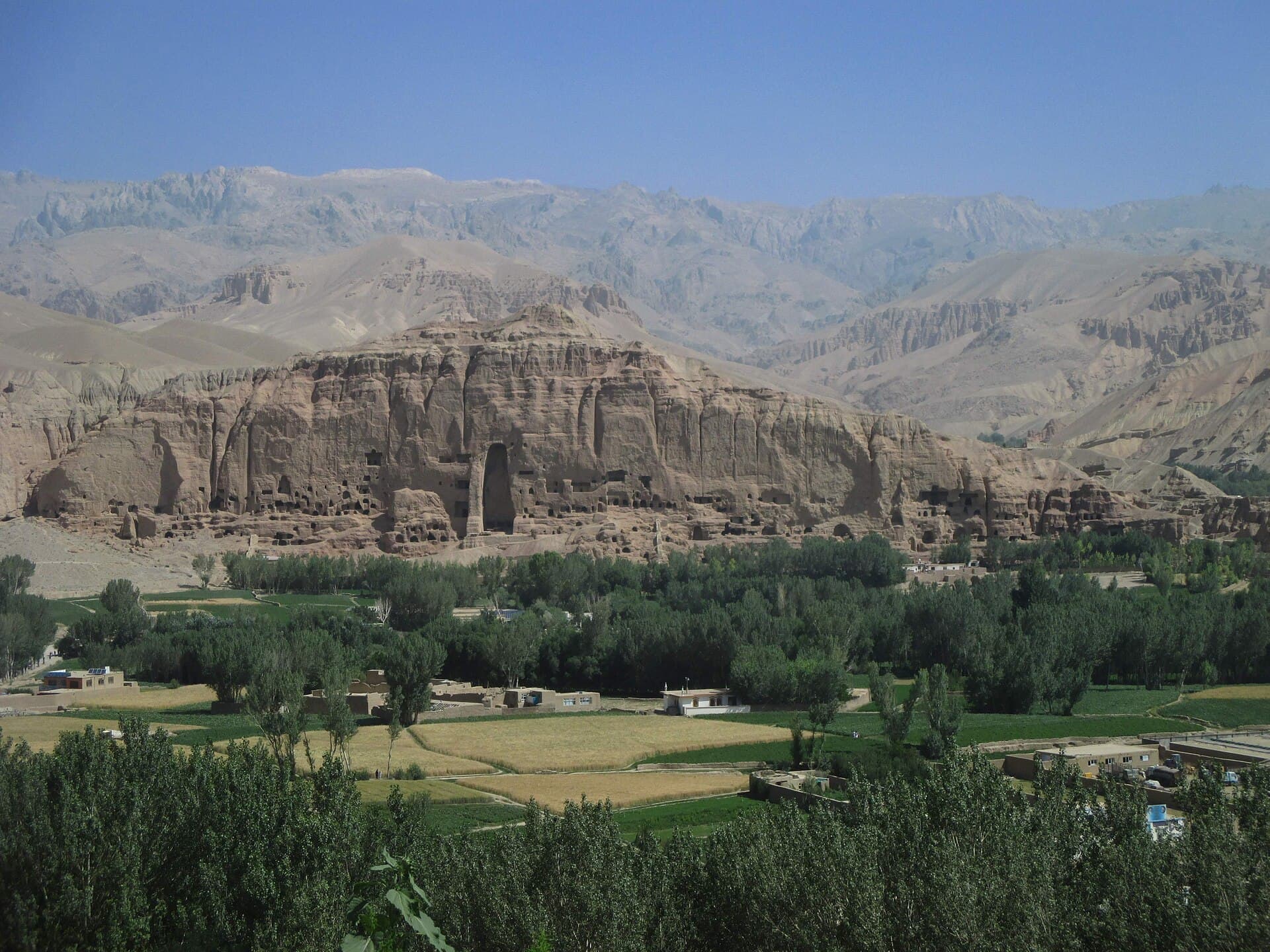 The Bamiyan cliff with the empty niche of the larger Buddha