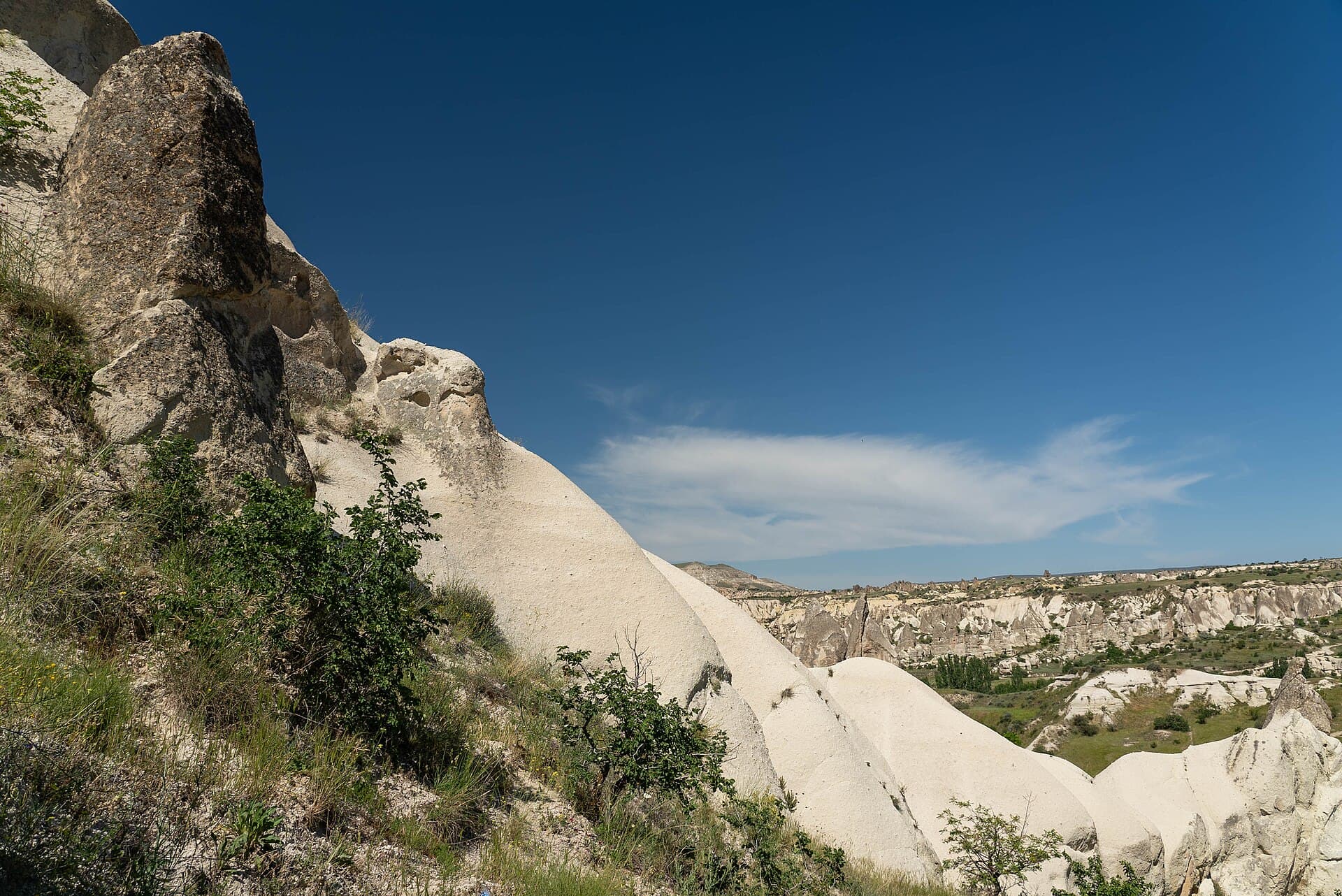 Fairy chimneys and carved dwellings in the Goreme valleys of Cappadocia