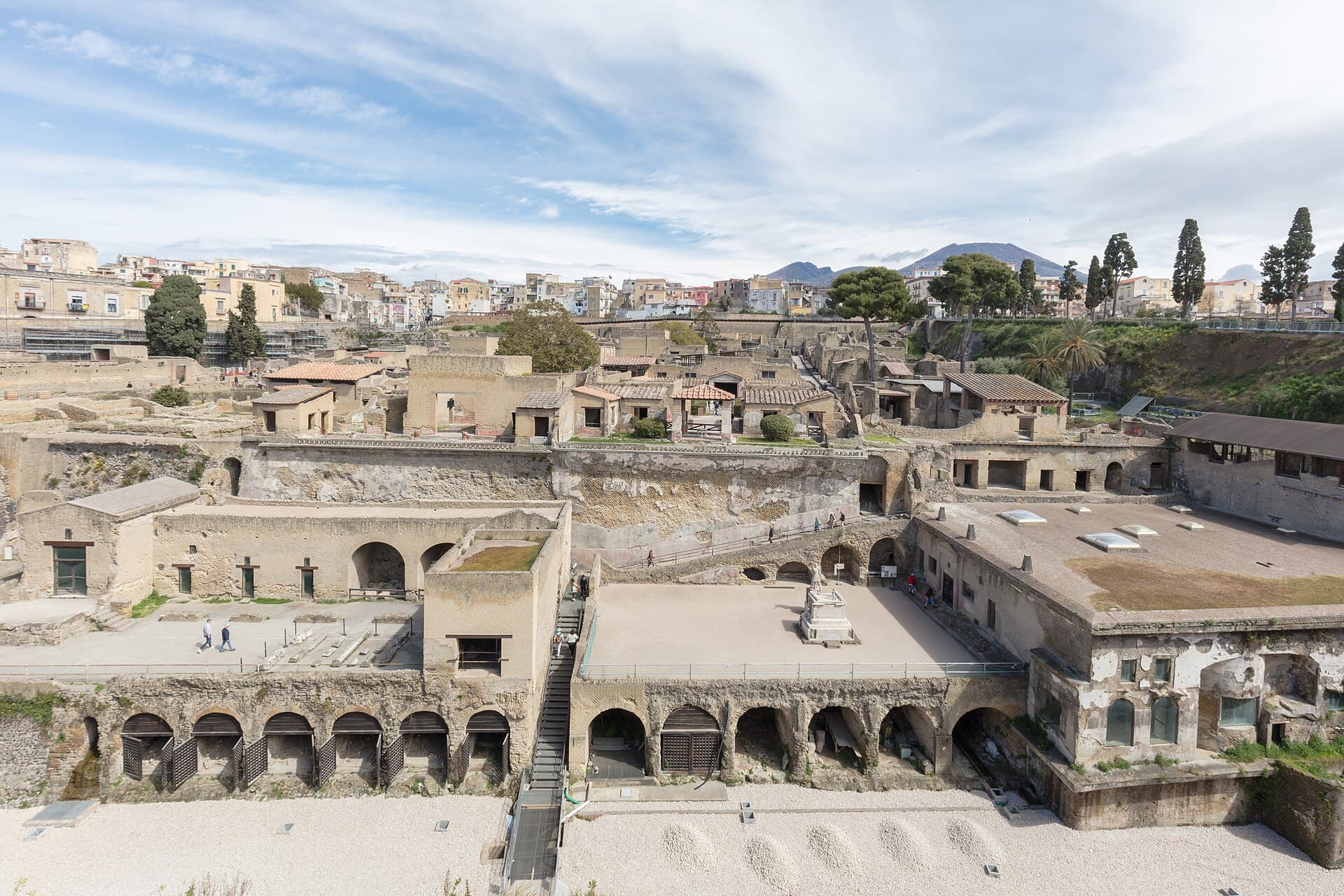 The excavated town of Herculaneum with modern Ercolano above and Vesuvius beyond