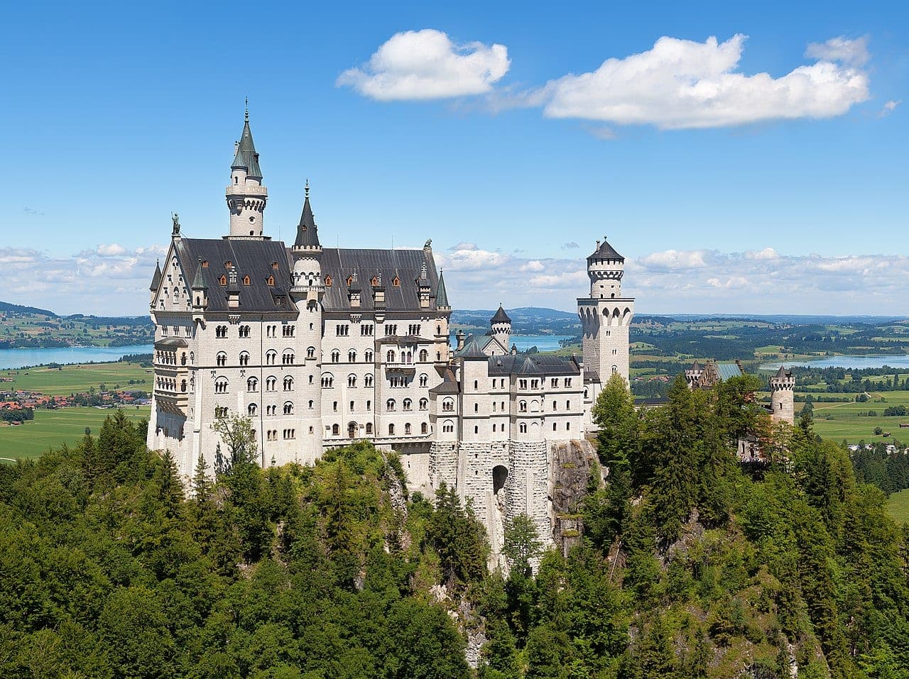 Neuschwanstein Castle on its hill in the Bavarian Alps, Germany