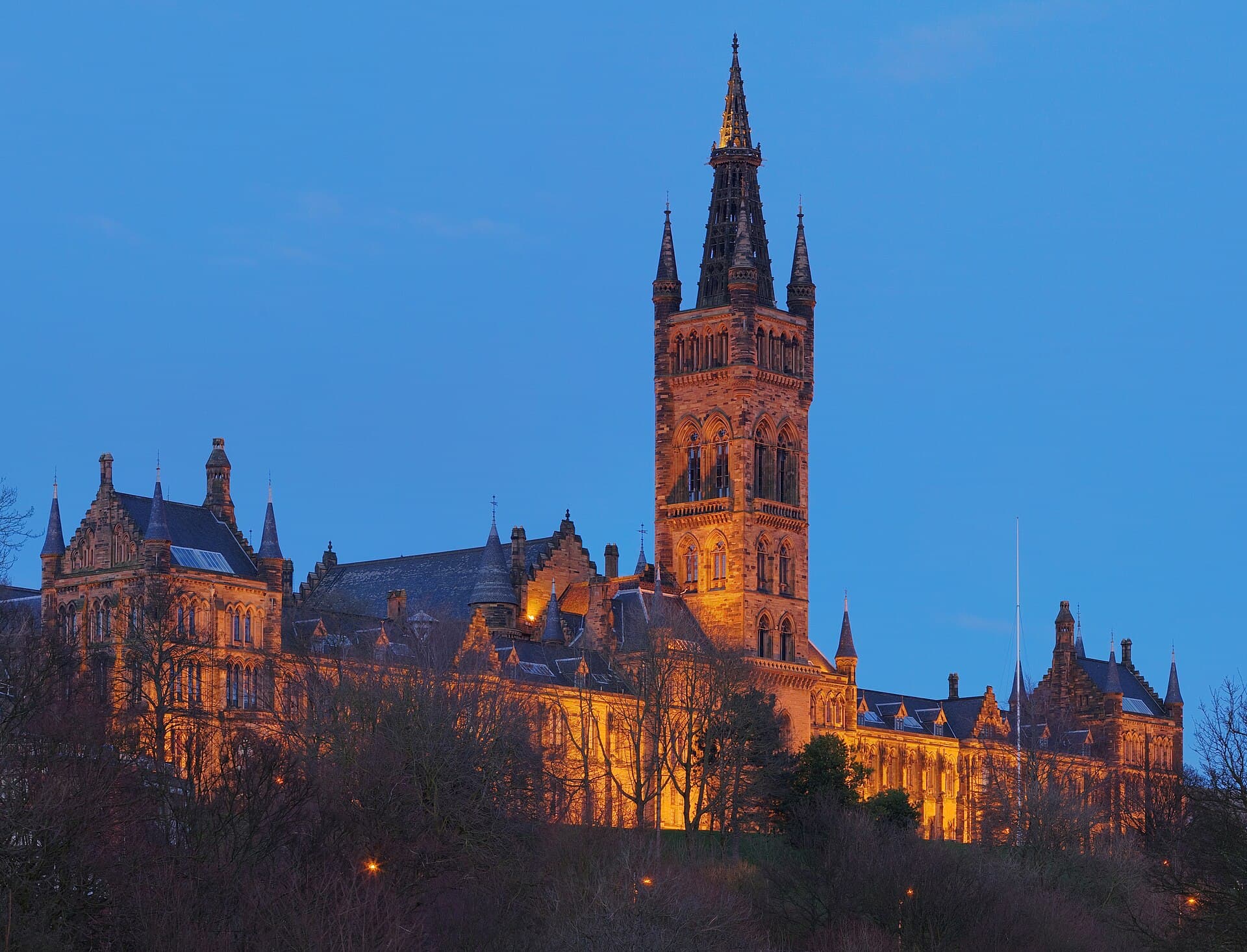 The Gilbert Scott Building of the University of Glasgow at dusk